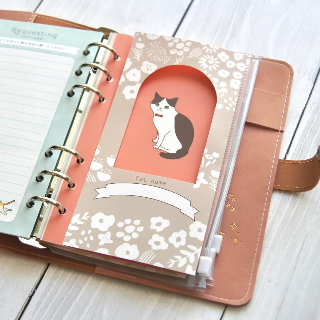 ねこヘルプ手帳:ピンク(バインダー式)|猫の通院・体調管理が一冊で|猫の健康管理手帳 - もしもshop Helmo